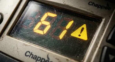 Gros plan sur le code erreur 61 et icône de sécurité d'une chaudière Chappée.